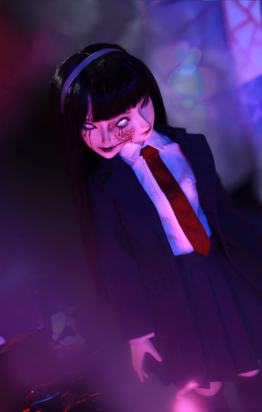Why does Tomie have another face?