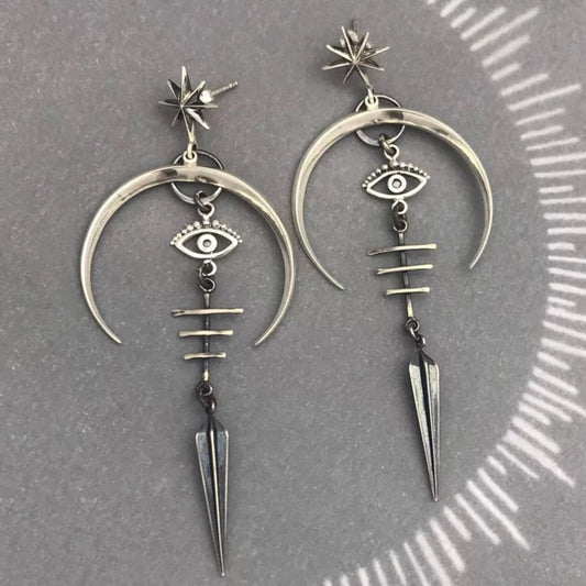 Unleash Your Inner Demon: Gothic Devil's Eye Earrings for a Dark and Edgy Look
